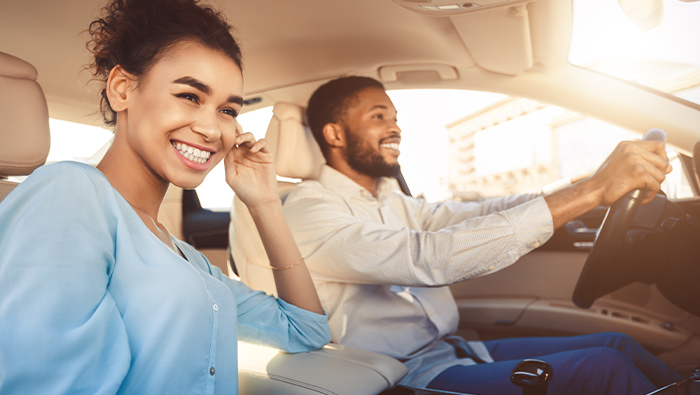 happy couple in car