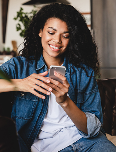 Young woman using phone