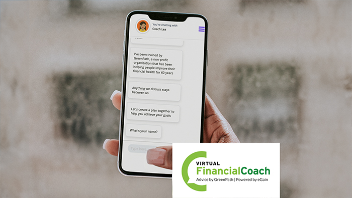 Virtual Financial Coach hand holding phone